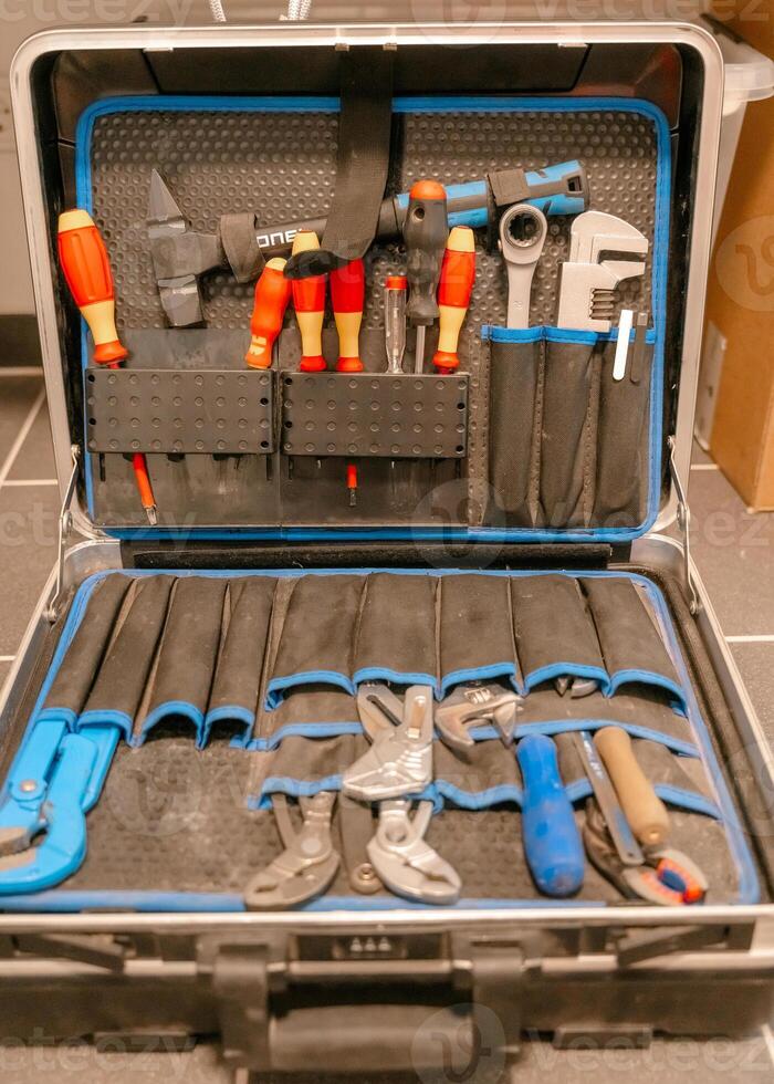 Organized Tool Kit with Assorted Tools Displayed photo