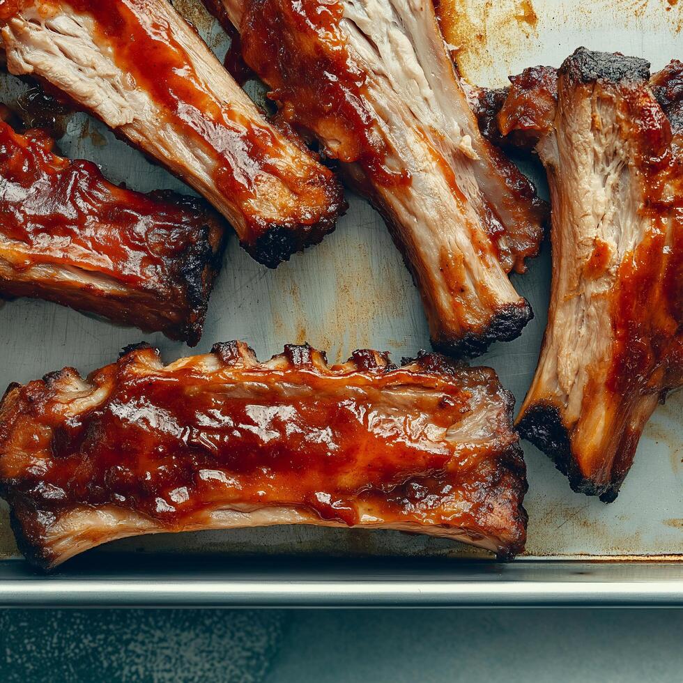 Barbecue ribs on a baking sheet photo