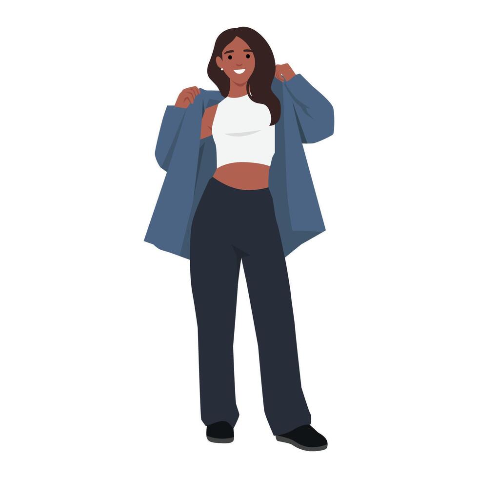 Woman stands smiling in fashionable outfit, featuring a white crop top, blue jacket, and dark pants. vector