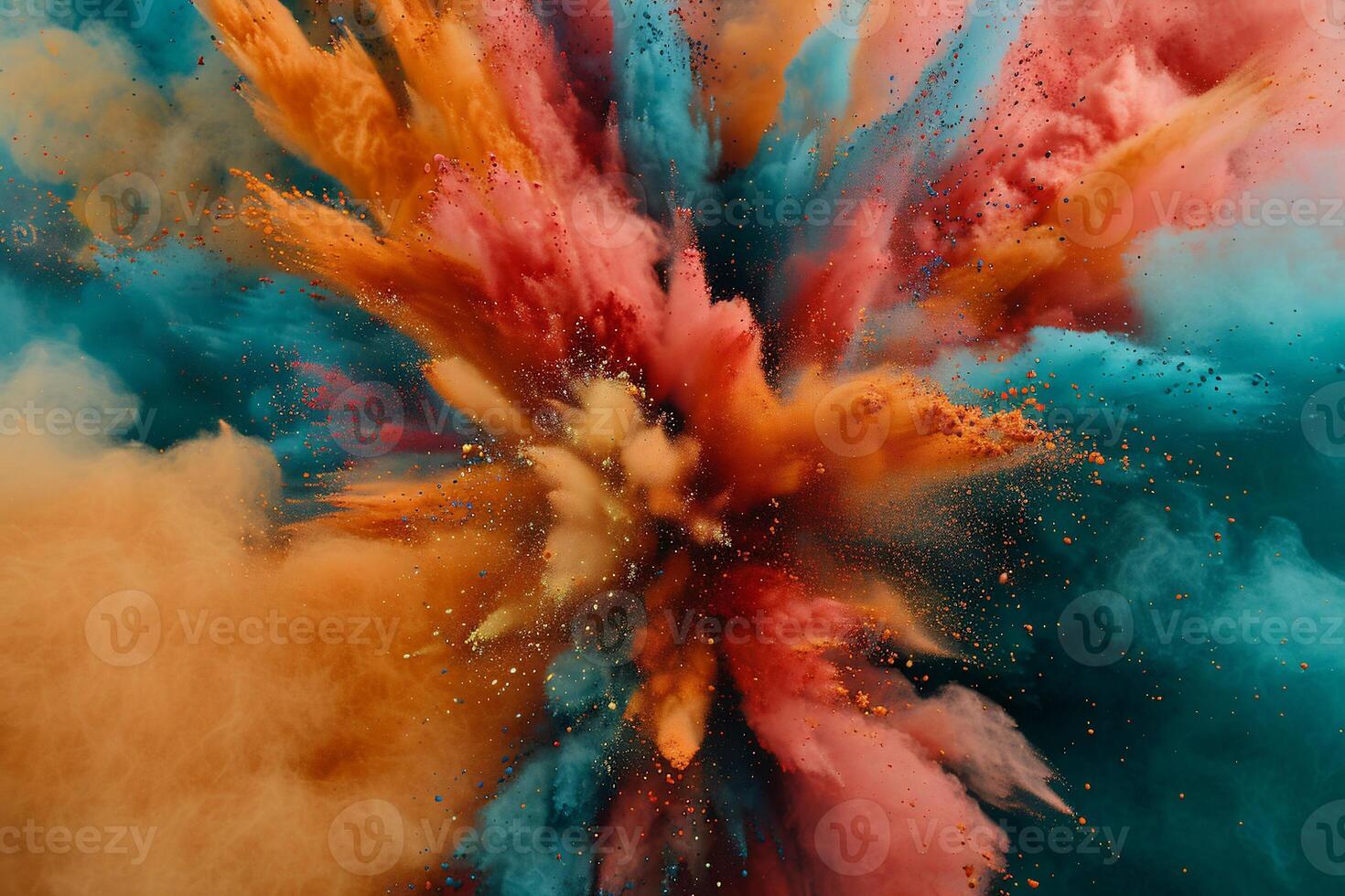 Colorful powder explosion on a blue background photo
