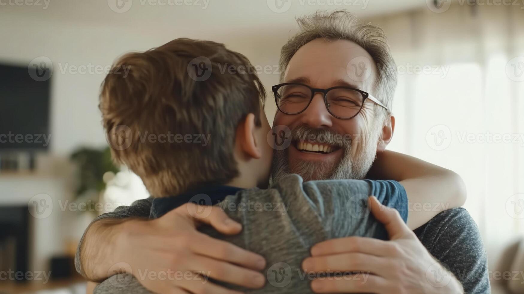 Warm hug between father and son photo