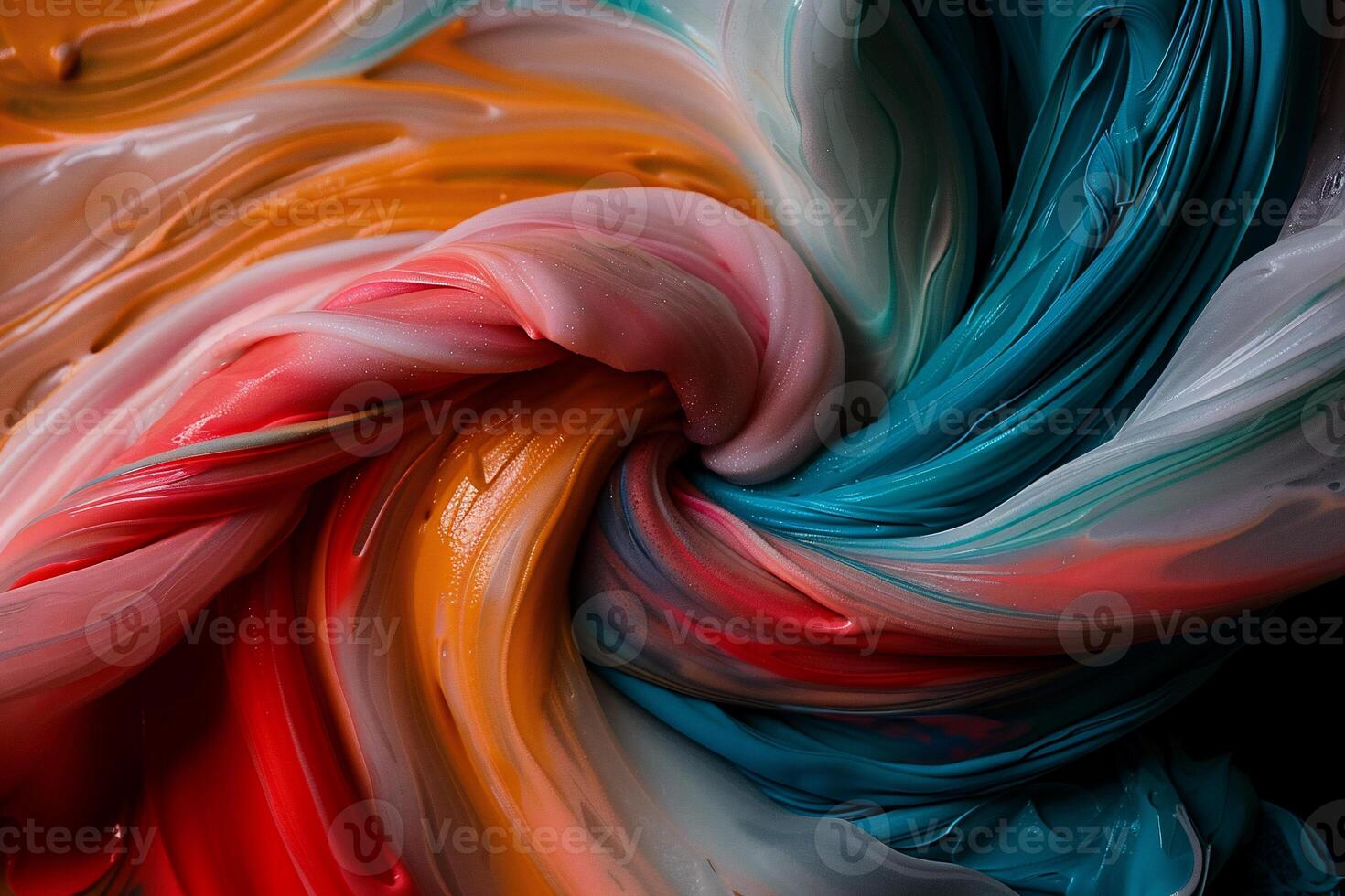 Colorful swirl of paint on black background photo