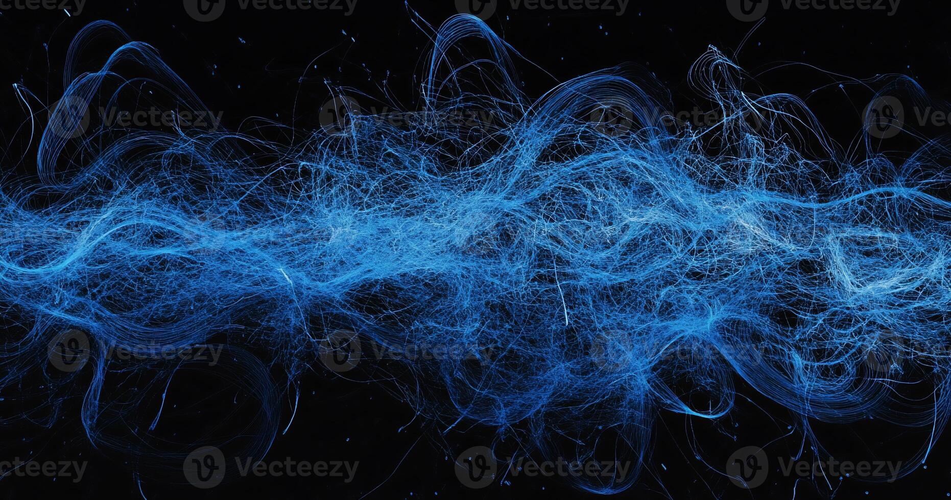 Abstract blue energy flowing across a dark background photo