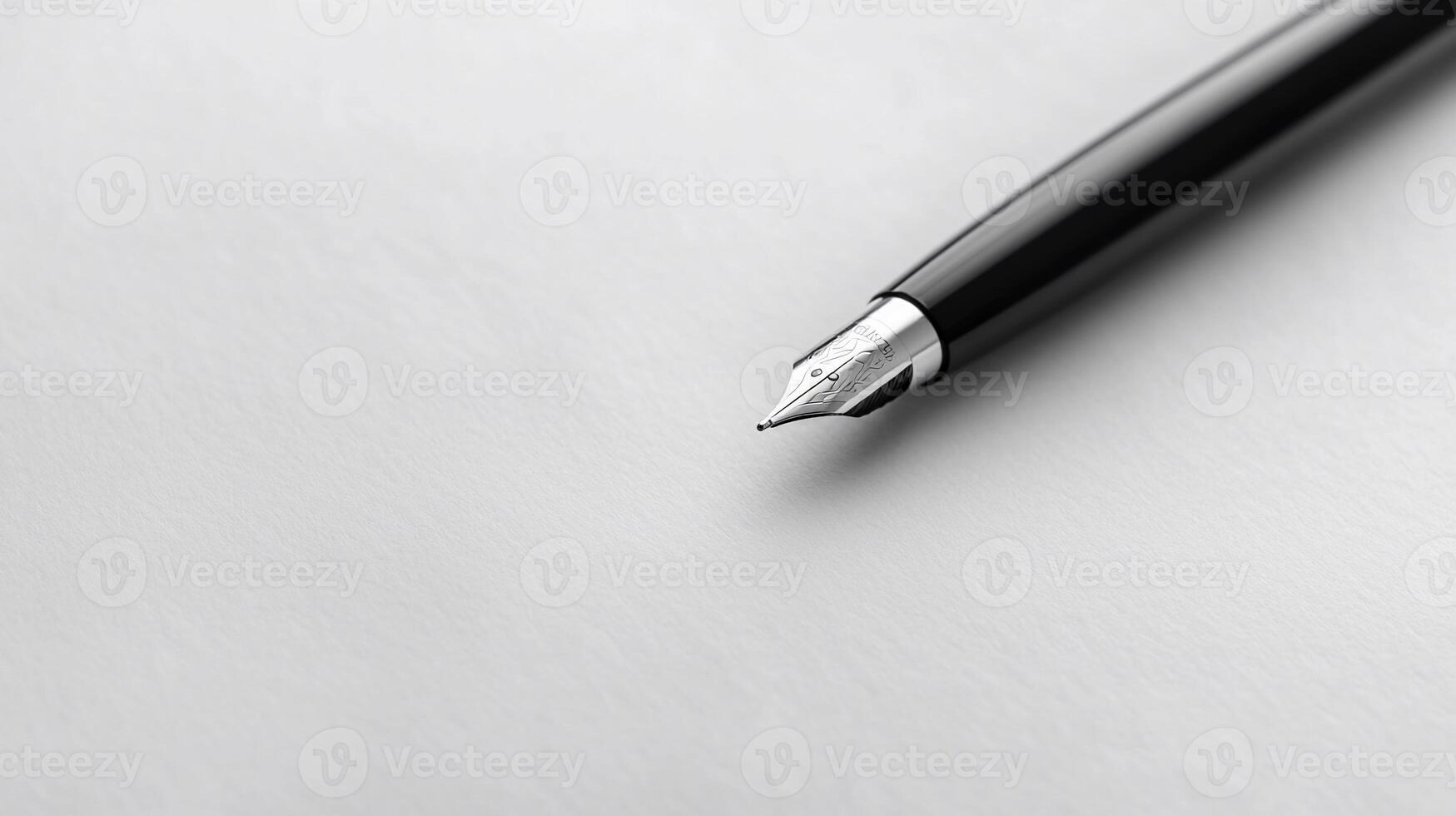 Close-up of a fountain pen on white paper. Fine nib detail photo