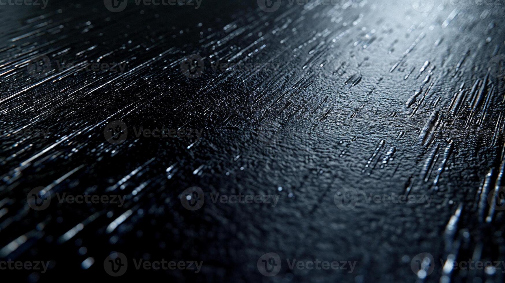 Dark, textured surface with linear patterns photo