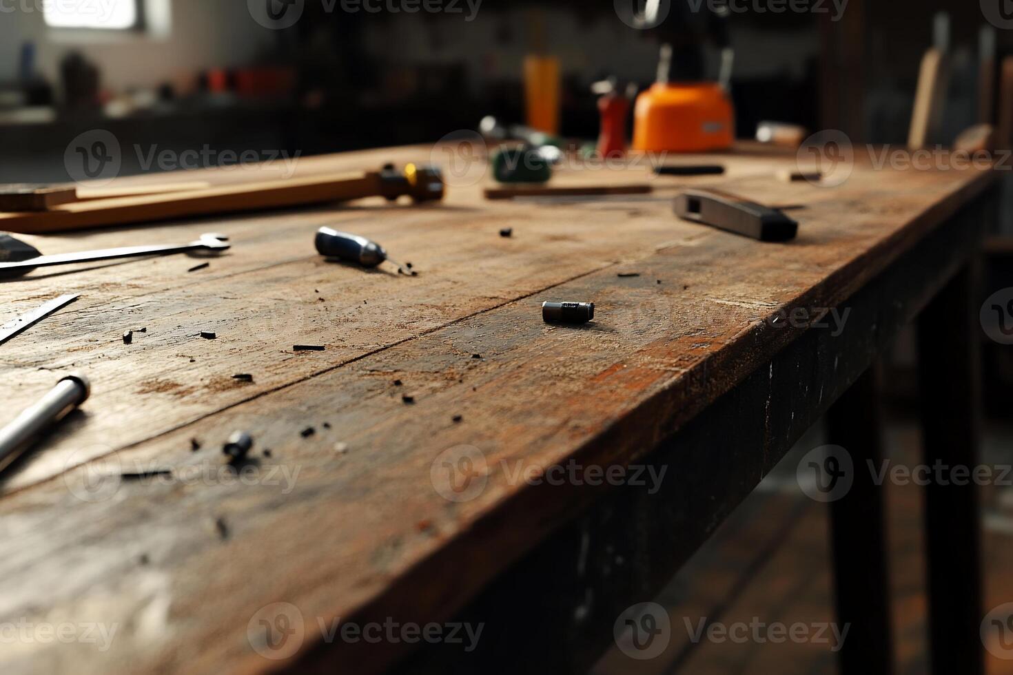 Wooden workbench cluttered with tools and scraps photo