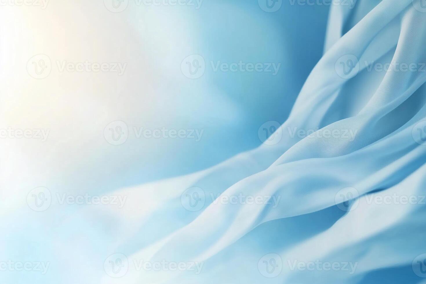 Blue silk fabric with light in the background photo