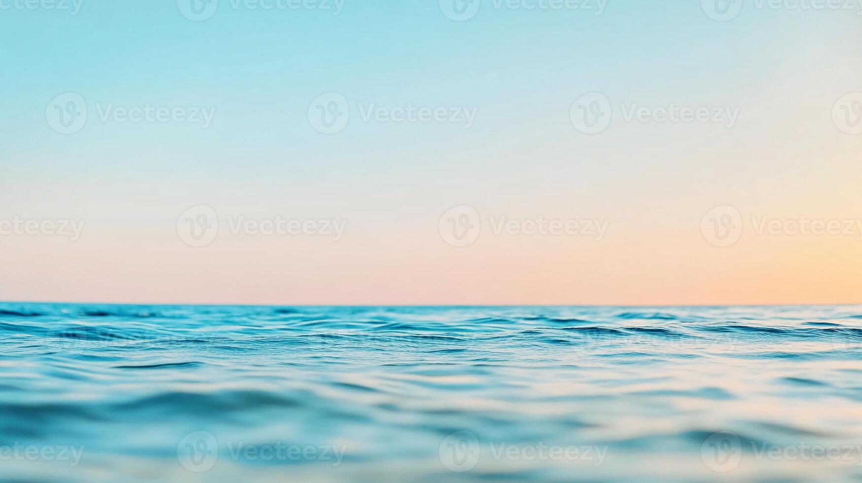 Soft hues of a tranquil ocean sunset photo