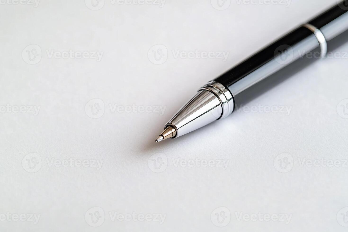 Close-up of black ballpoint pen photo