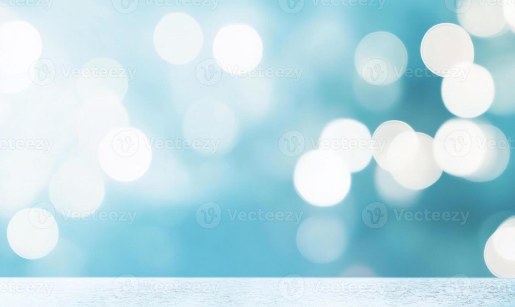 Soft, light blue bokeh background with a smooth, flat surface photo