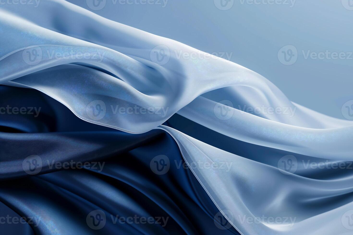 Fluid, flowing fabrics in shades of blue and light blue. Detailed, elegant folds and drapes photo