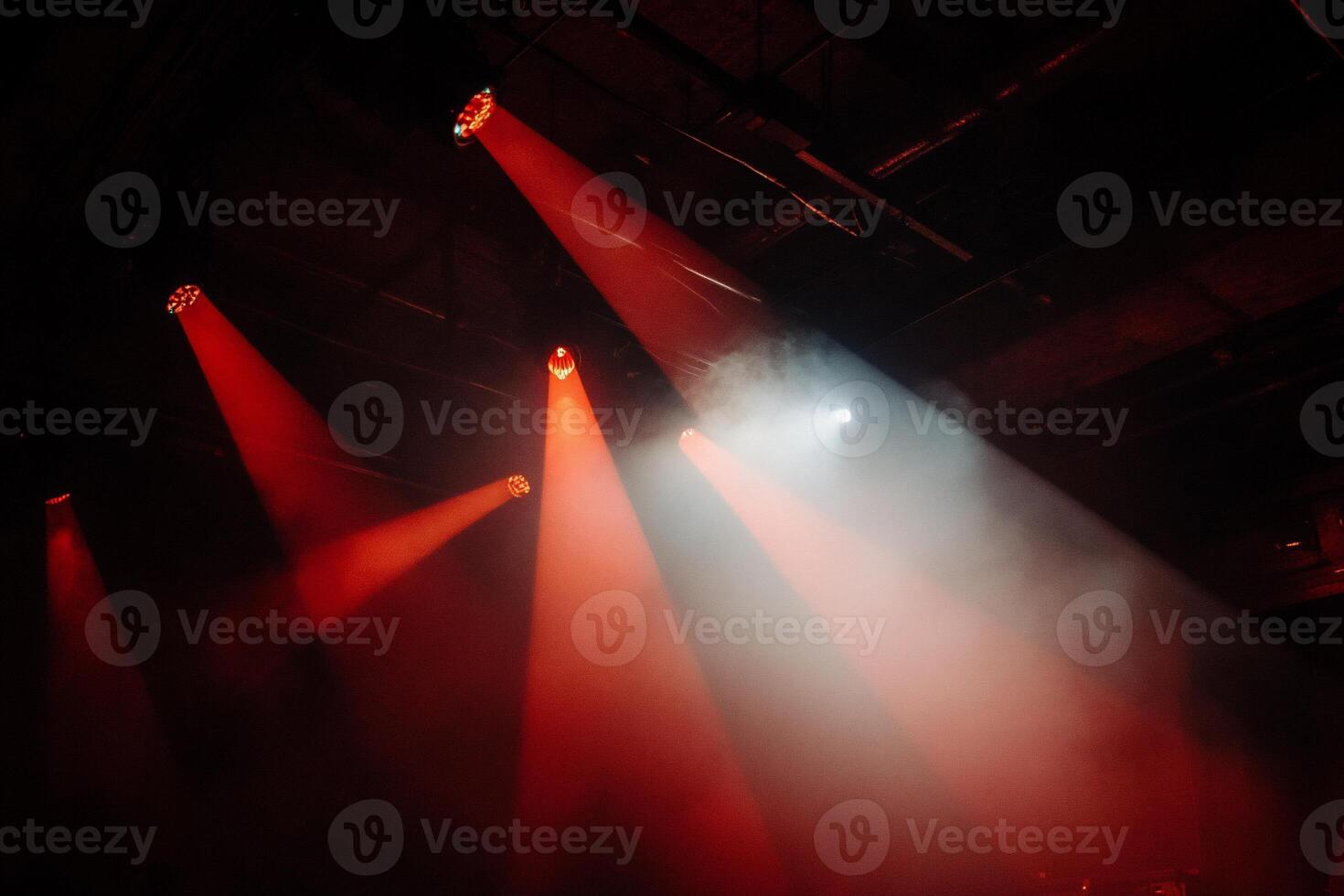 Stage lights illuminating smoky atmosphere photo
