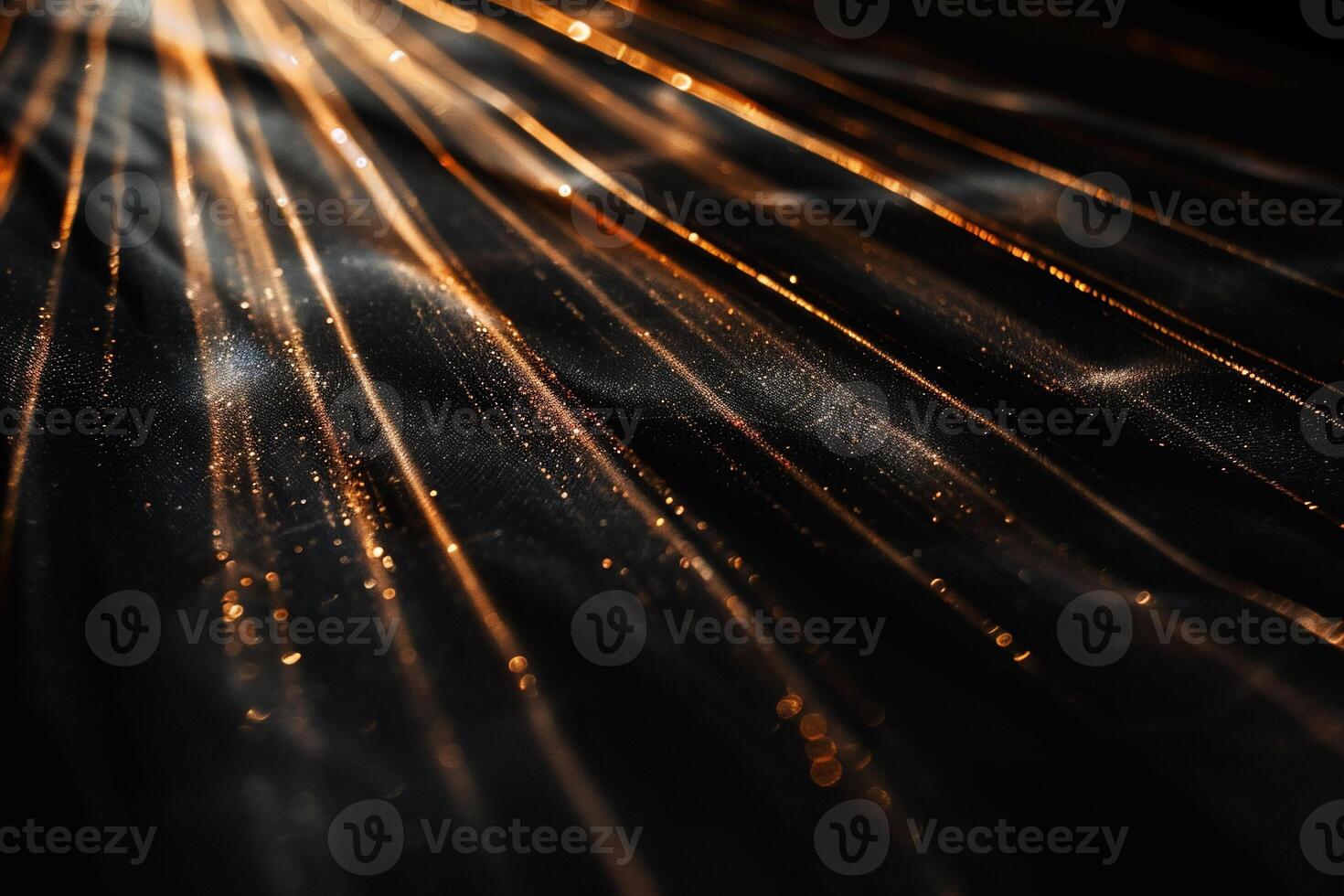 Abstract golden lines radiating across dark surface photo