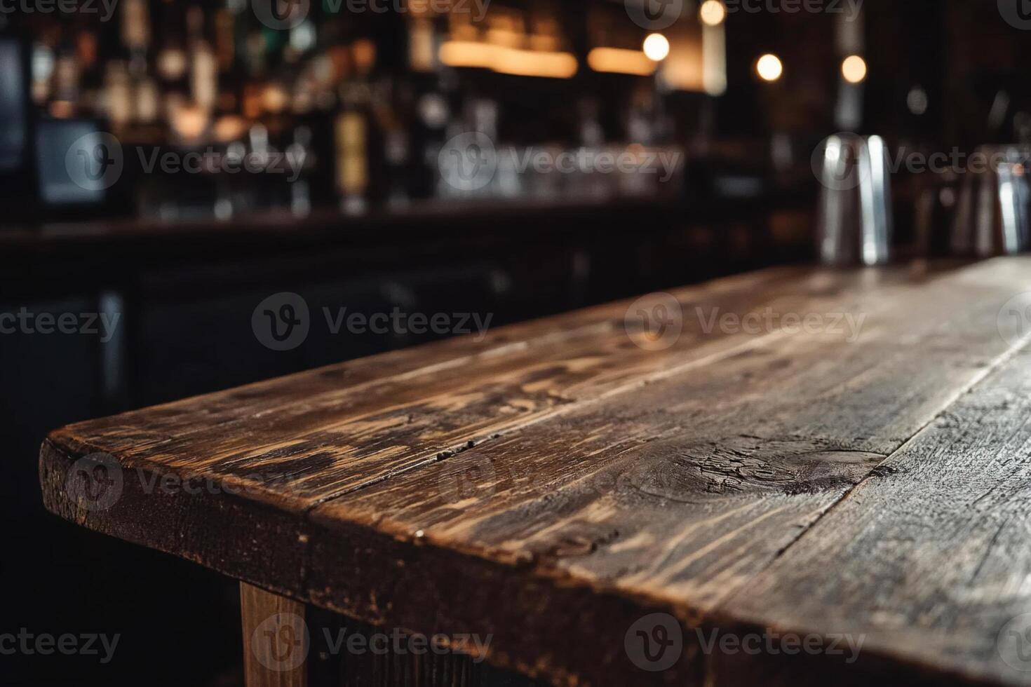 A close up of a bar counter with a wooden top photo
