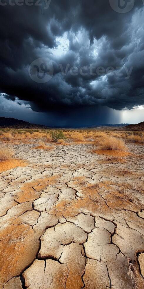 Clouds hover over a dry desert photo
