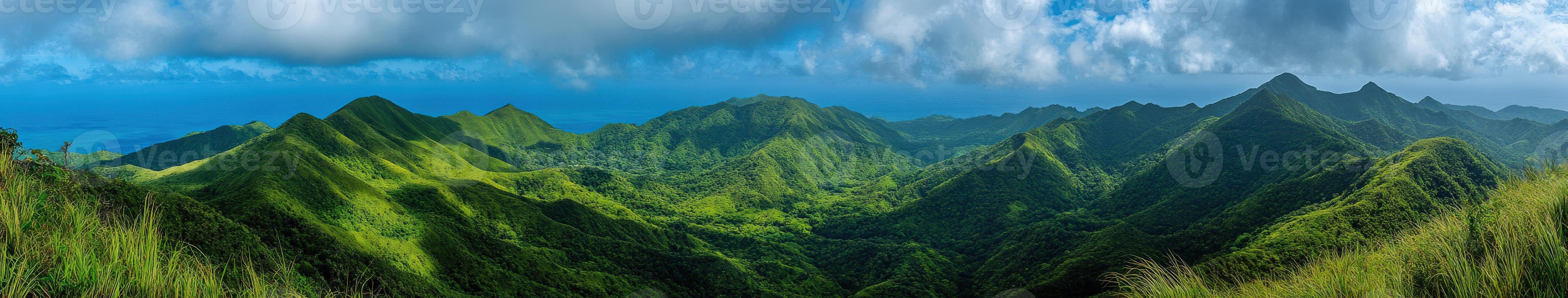 A beautiful view of green mountains and clouds photo