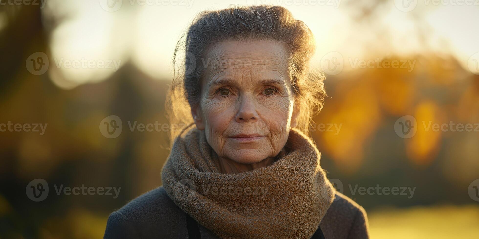 An older woman wearing a scarf in the sun photo