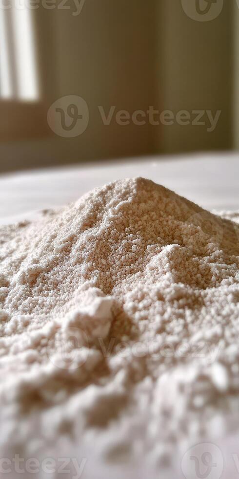 Psyllium husk powder on a table surface at daylight photo