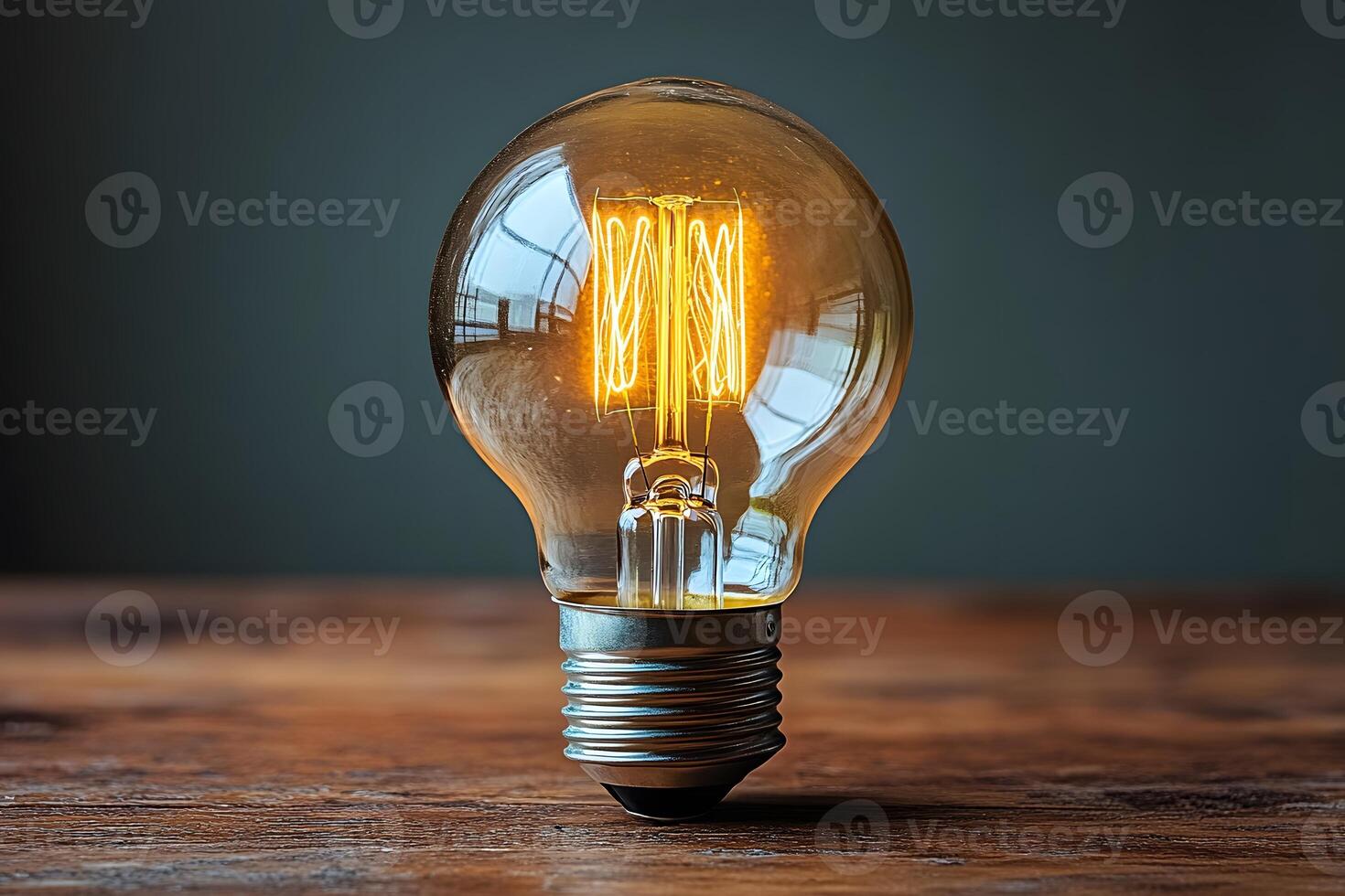 Vintage Incandescent Light Bulb on Wooden Surface for Creativity and Innovation Concepts photo