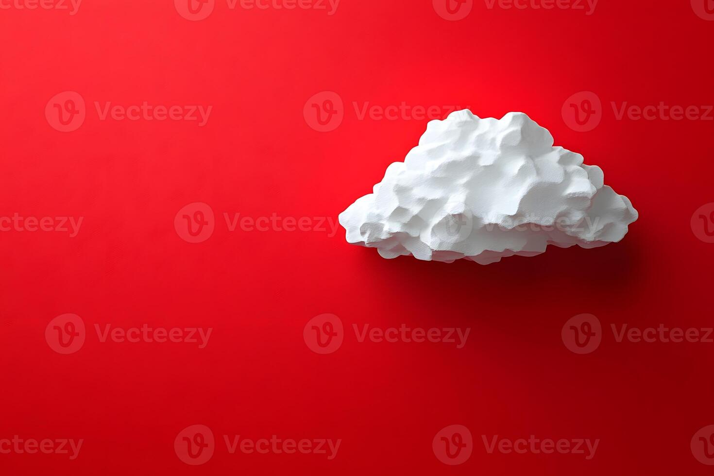 Minimalist Cloud Sculpture on Bold Red Background for Creative Design photo