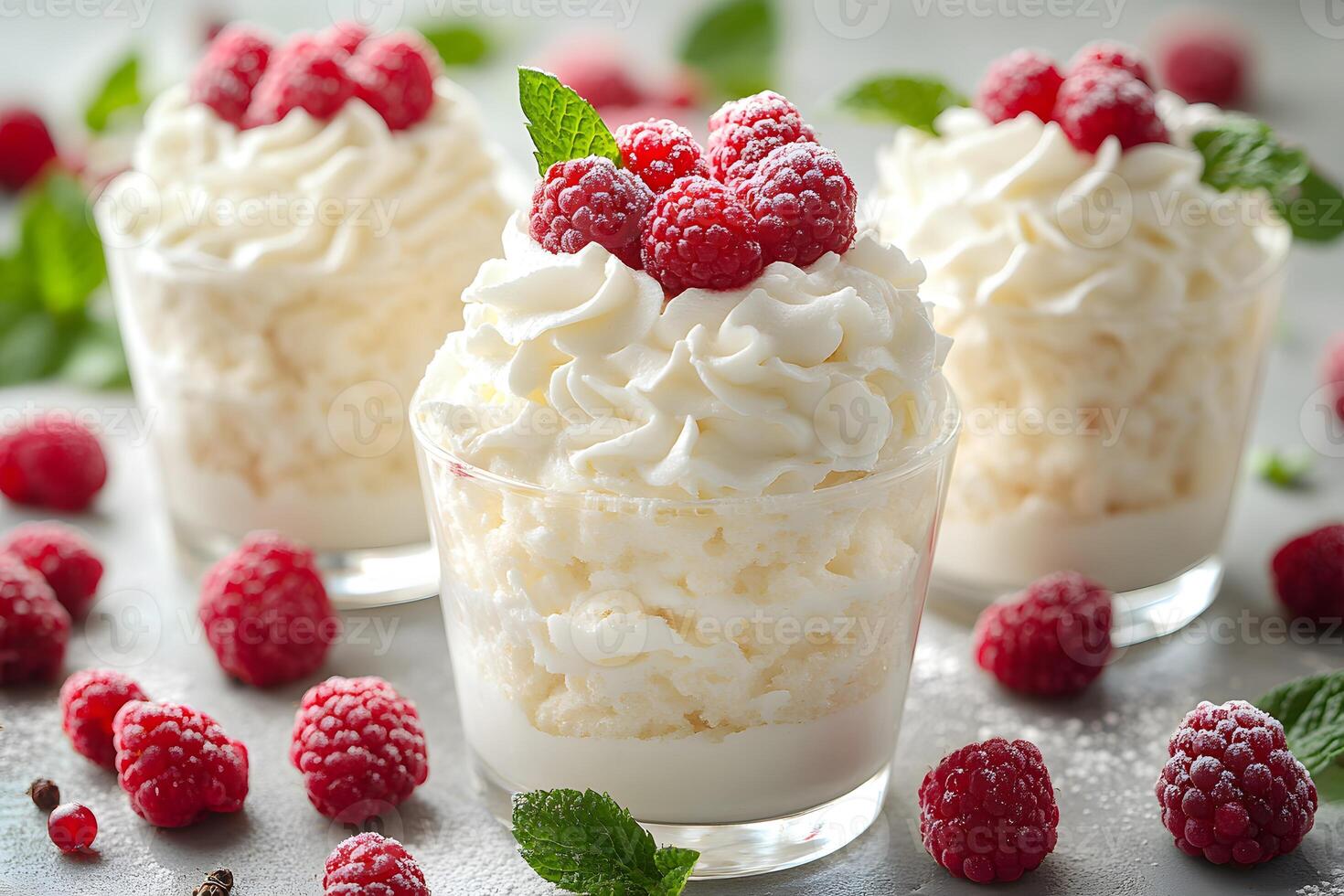 Decadent Raspberry and Cream Dessert in Elegant Glasses for a Sophisticated Culinary Presentation photo