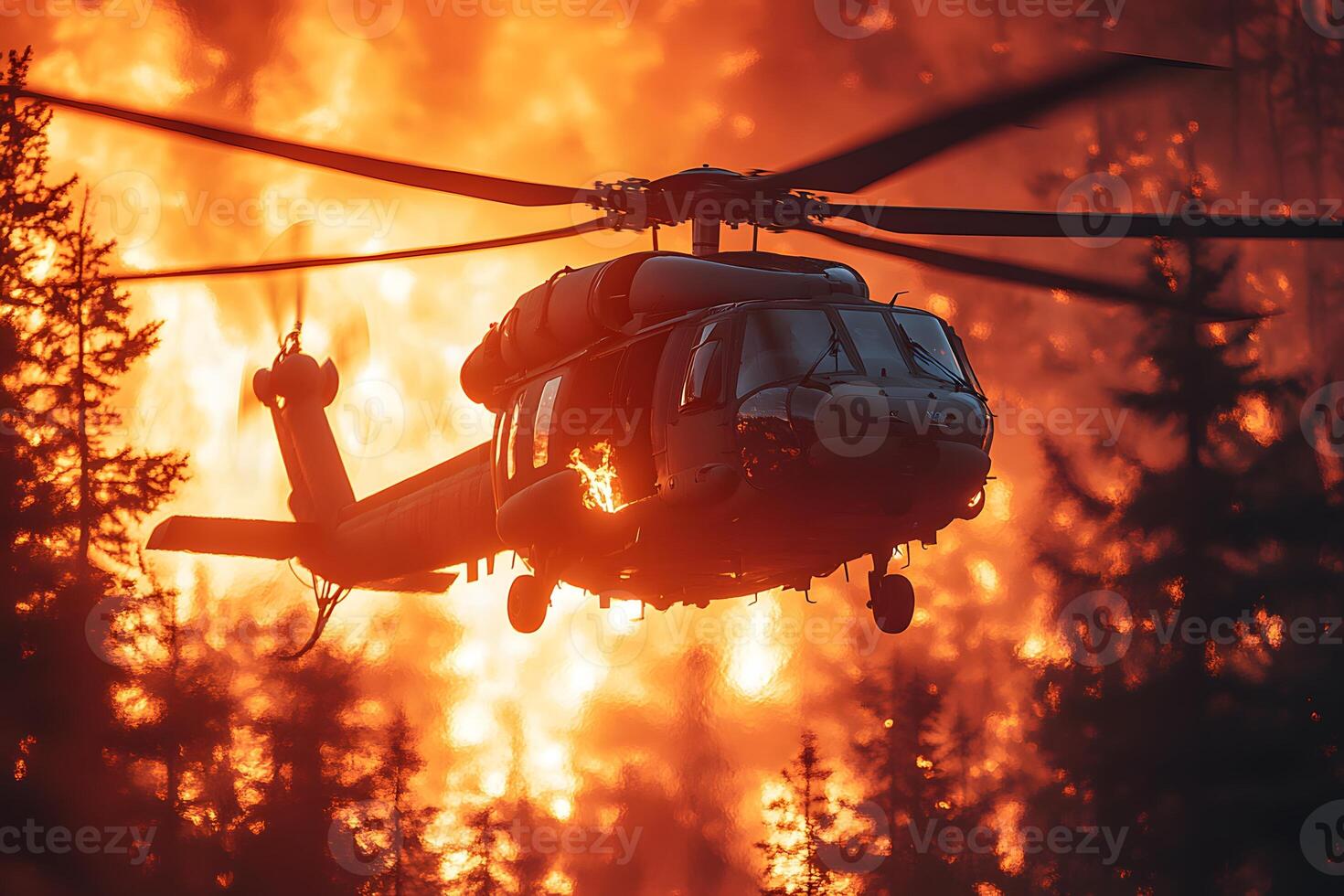 Helicopter in Action Firefighting Mission Amidst a Forest Wildfire photo