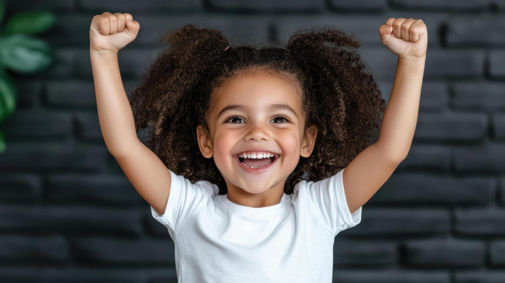 joyful girl celebrating with raised arms, expressing happiness and excitement photo