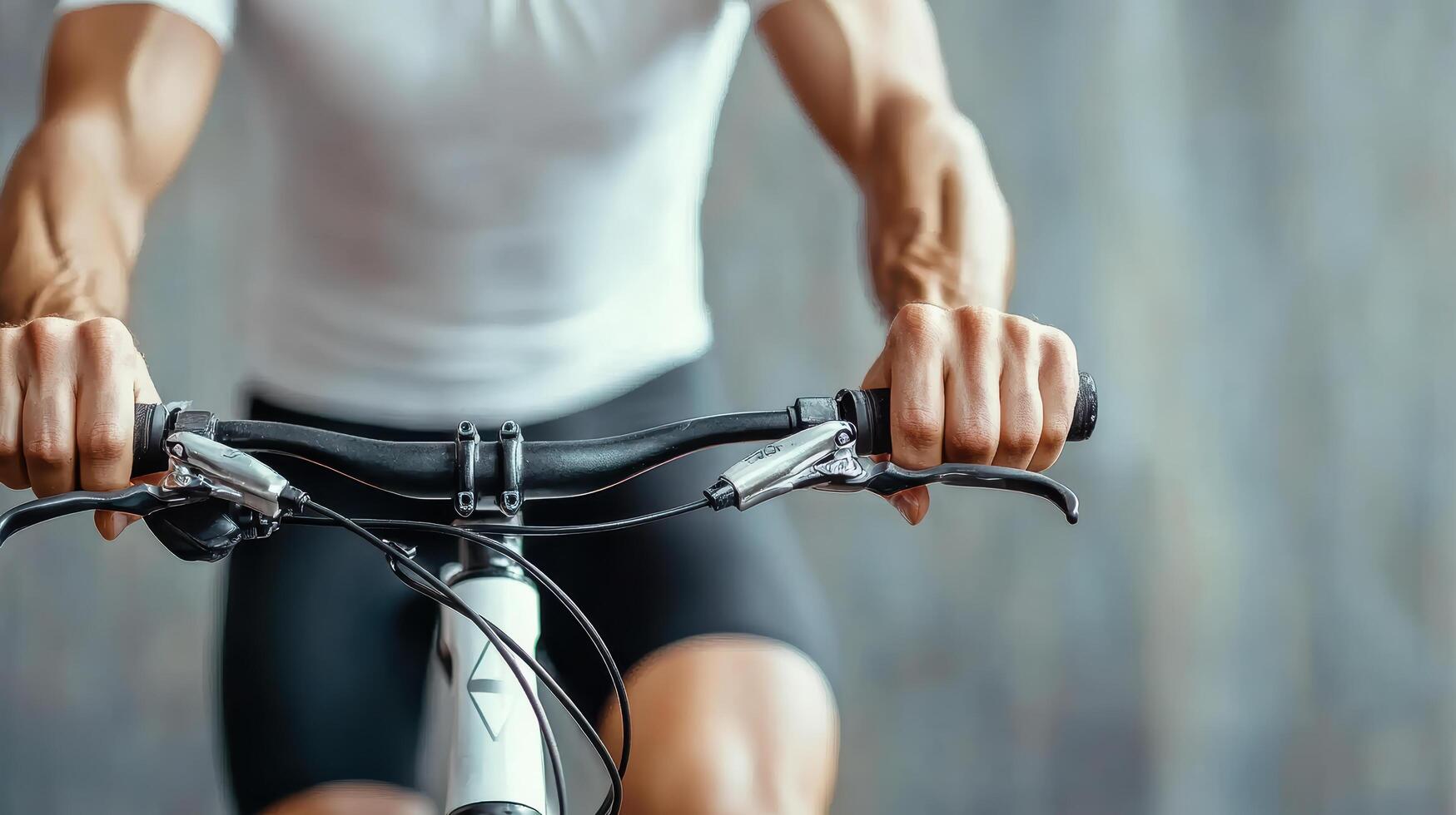 A close up of a man riding a bike photo
