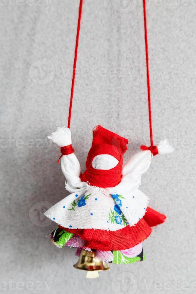traditional doll amulet bereginya on wall closeup photo