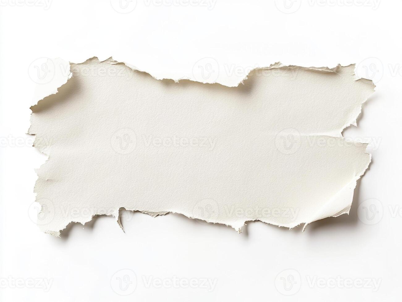 Torn white paper sheet on a plain background for creative use photo