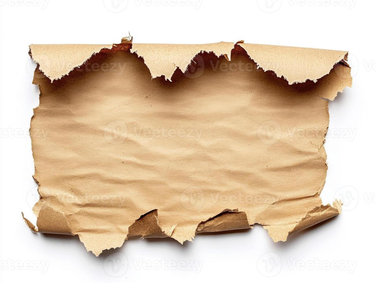 Torn brown paper sheet creating a rustic backdrop for crafts photo