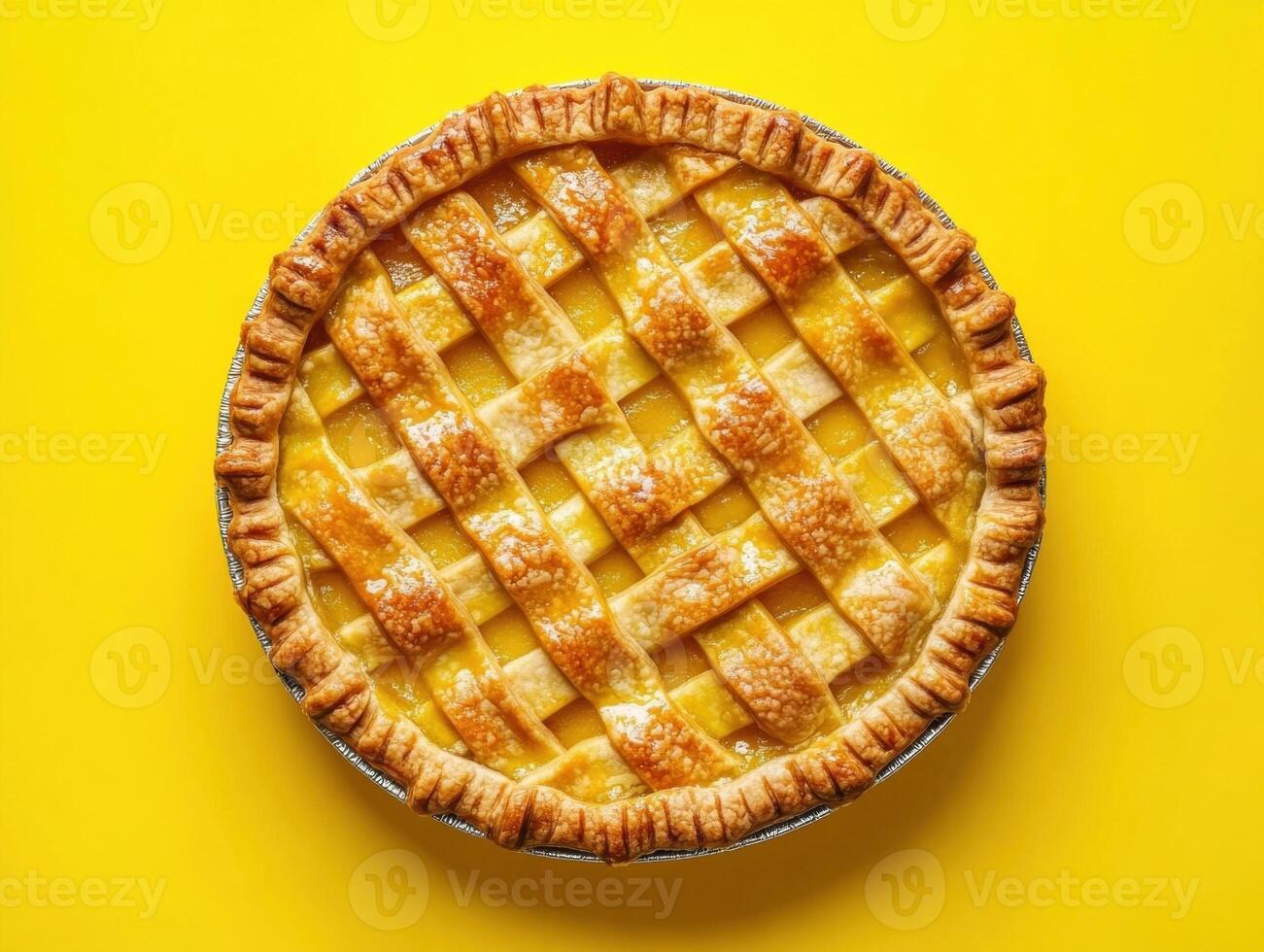 Freshly baked pie with a golden lattice crust on a bright background photo