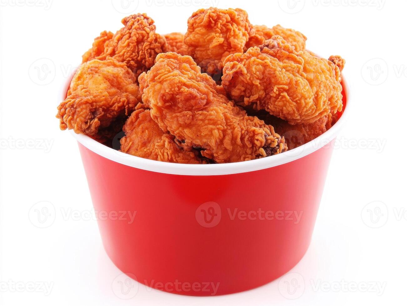 Crispy fried chicken served in a red takeaway bucket photo