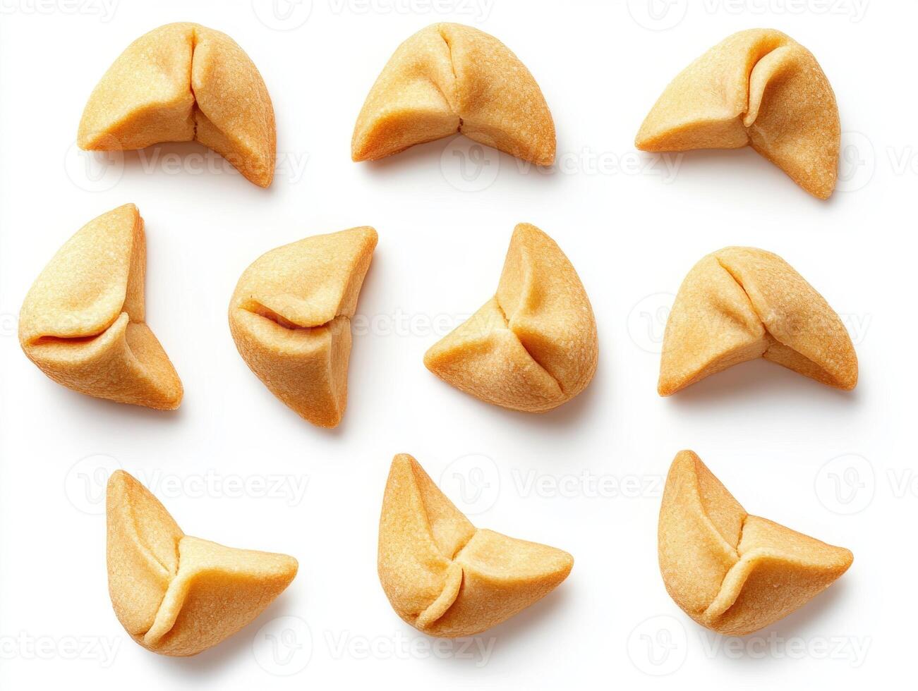 Fortune cookies arranged in a playful pattern on a white surface photo