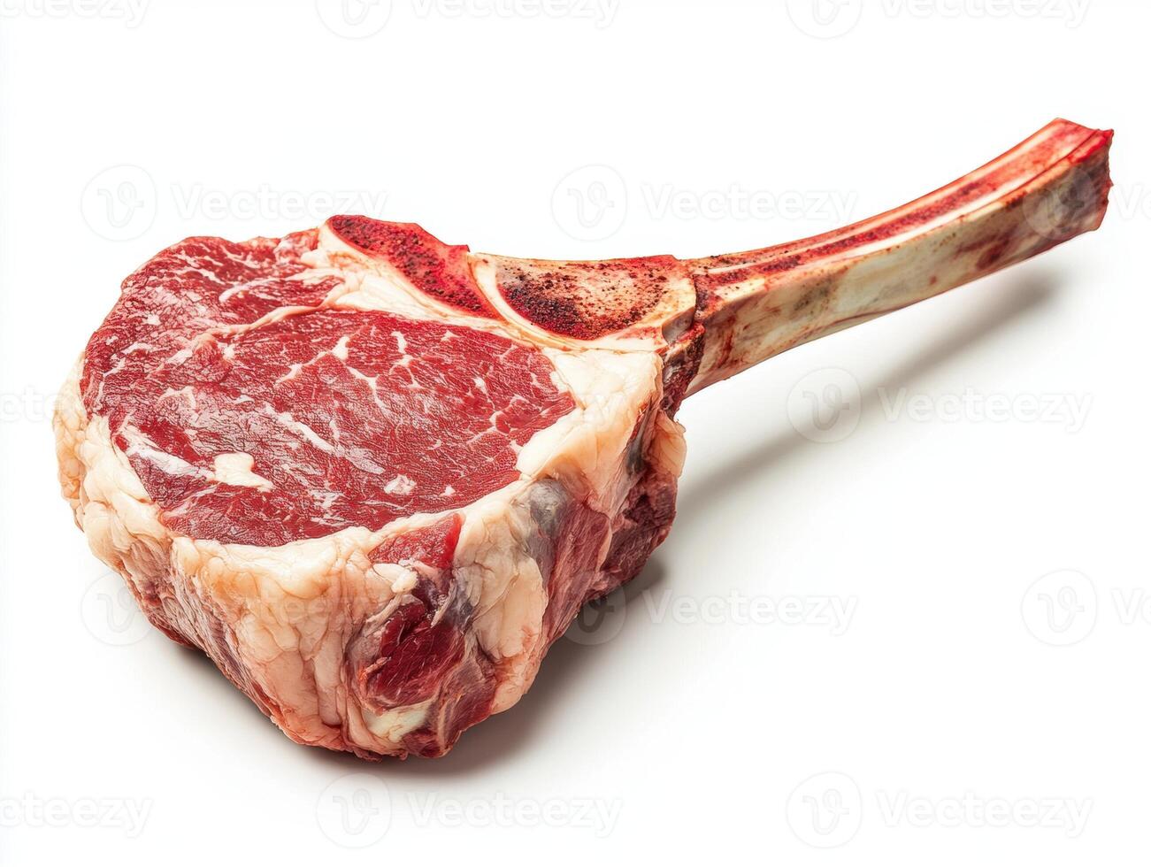 Juicy tomahawk steak ready for grilling at home kitchen photo