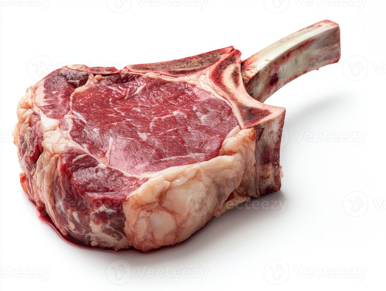 Freshly cut tomahawk steak ready for grilling or cooking photo