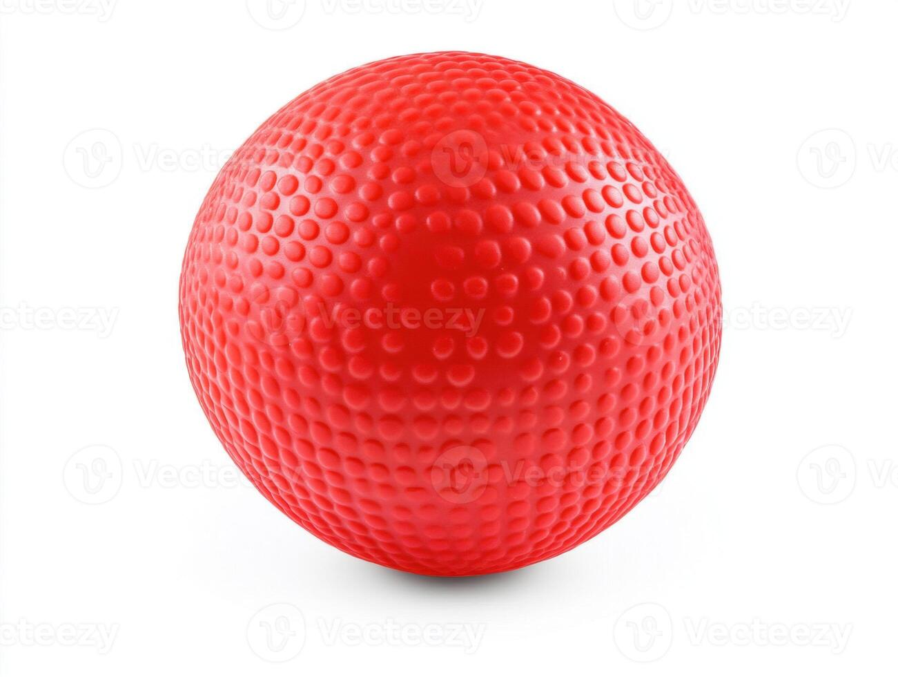 Bright red rubber ball with textured surface for active play photo