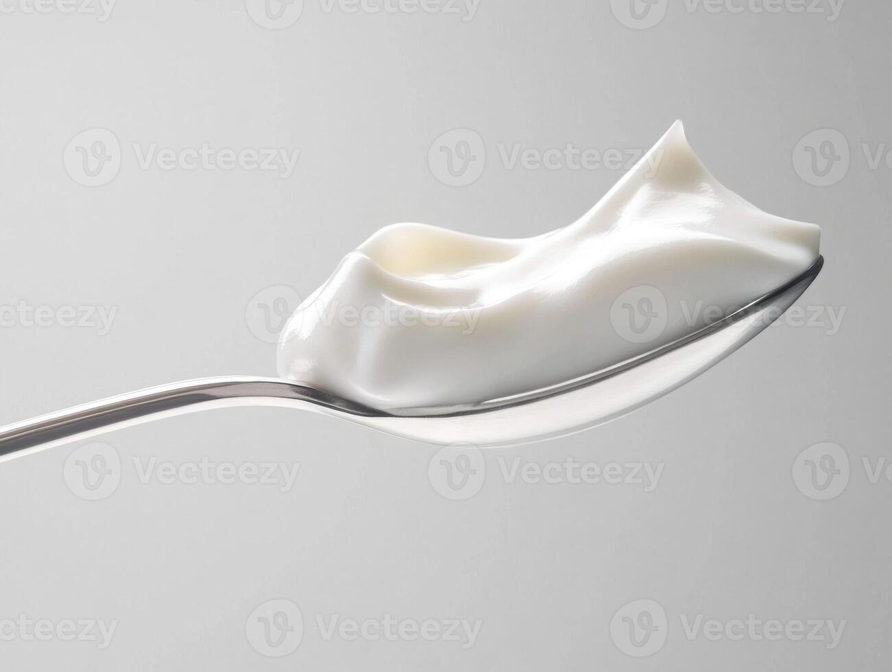 Creamy texture on spoon shows fresh ingredient ready for use photo