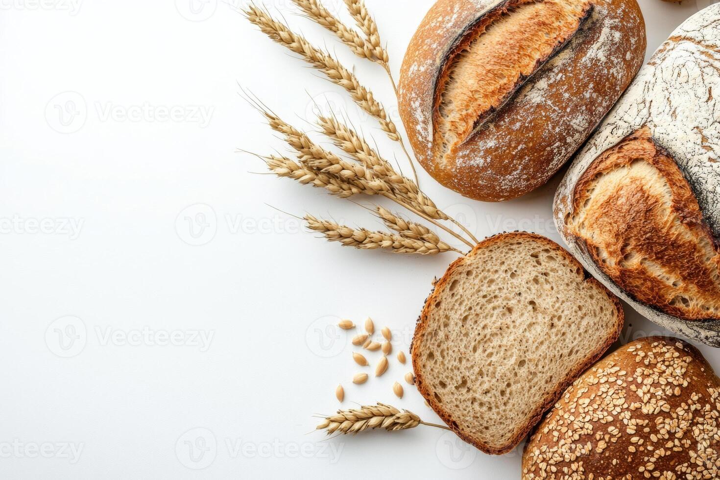 Artisan breads and grains arranged on a clean surface photo