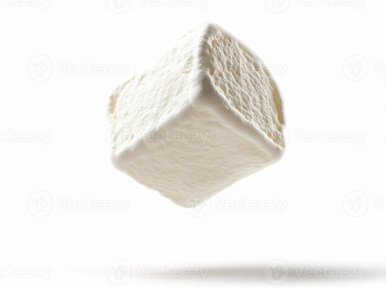 Floating marshmallow cube against a white background photo