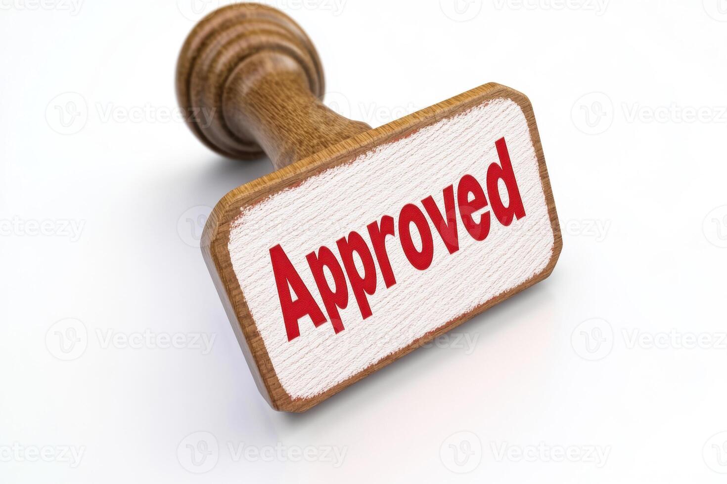 Red approved stamp on wooden handle for document verification photo