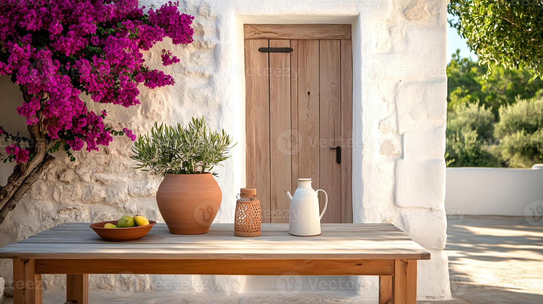 Bougainvillea blooming near wooden table with decorations in front of white wall and door photo