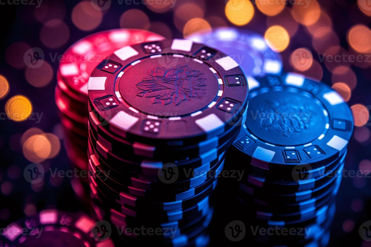 Casino chips stacked high under colorful bokeh lights photo