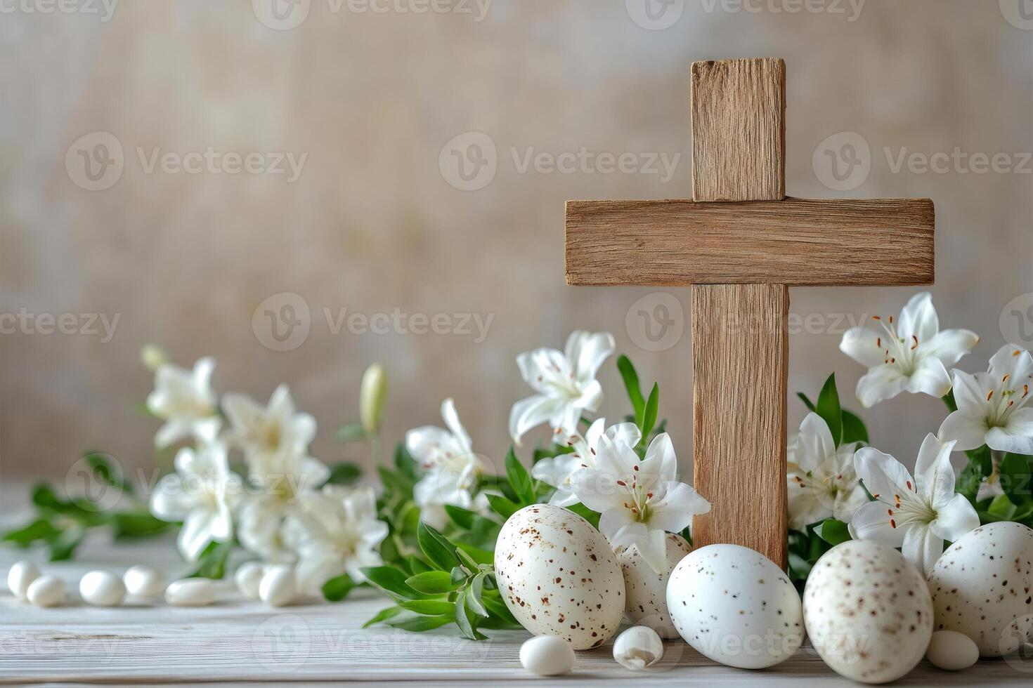 Easter eggs and white lilies decorating wooden cross on table photo