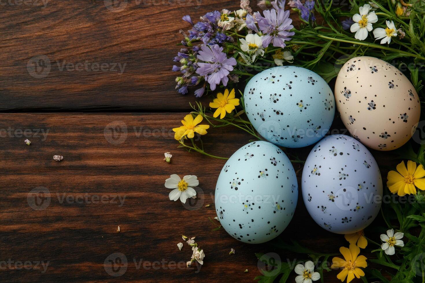 Easter eggs with spring flowers resting on rustic wooden table.. photo