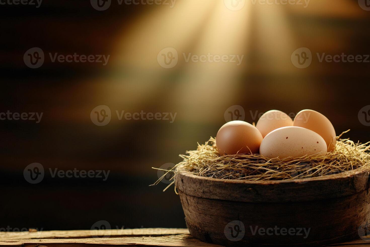 Fresh eggs nestling in a rustic wooden bowl, illuminated by golden light photo