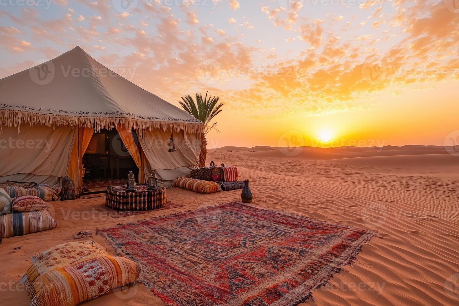 Luxurious desert camping experience at sunset with traditional tent photo