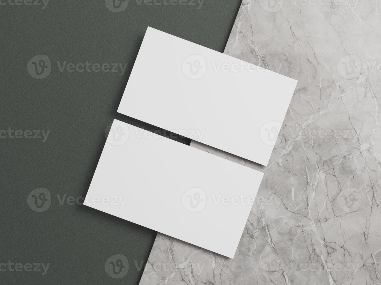 Business card mockup with white cards aligned on a gray marble background and dark green section. photo