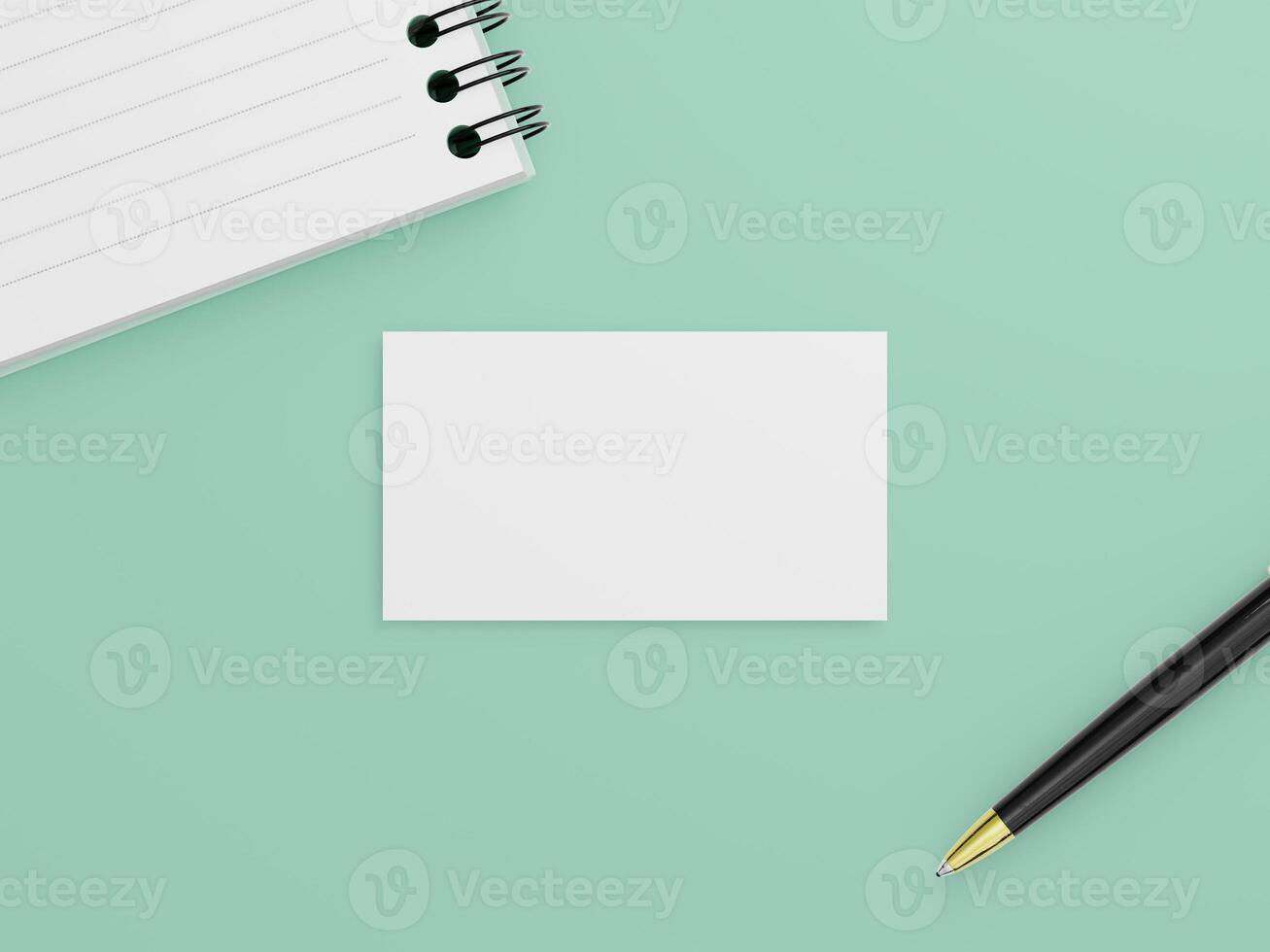 A business card mockup with a simple card, accompanied by a black pen and a spiral-bound notepad. photo