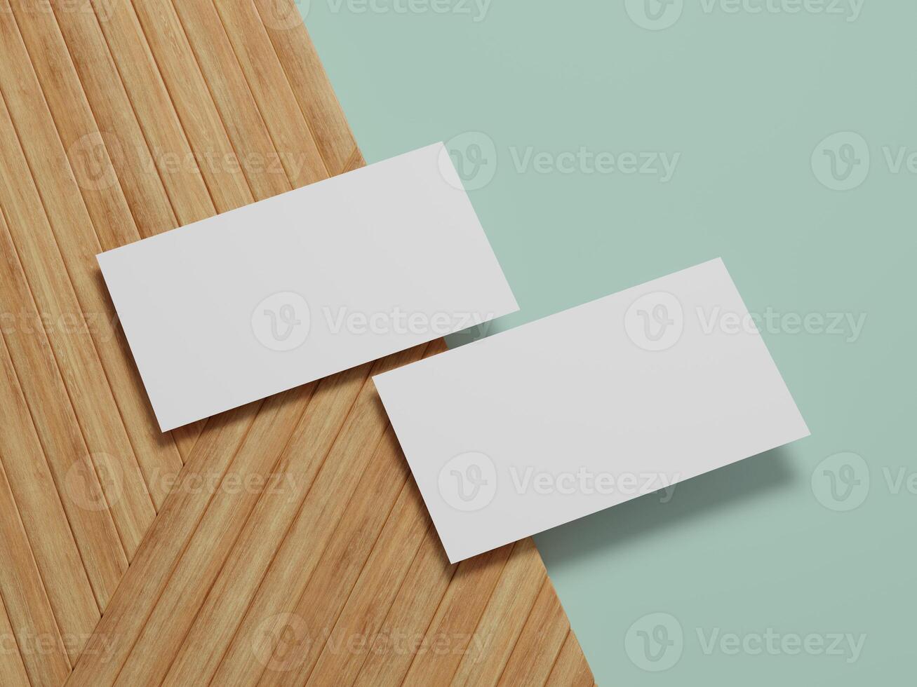 Unique business card arrangement on a mint green and wood backdrop, perfect for contemporary branding ideas. photo